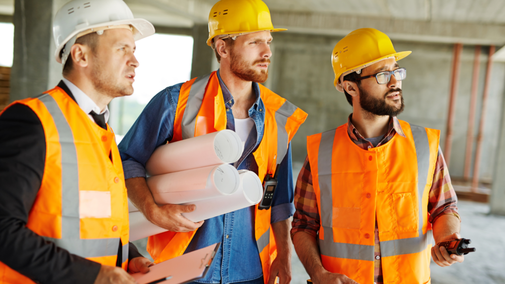 builder using tools on site