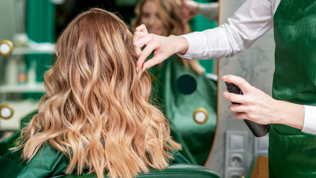 woman cutting hair in a salon