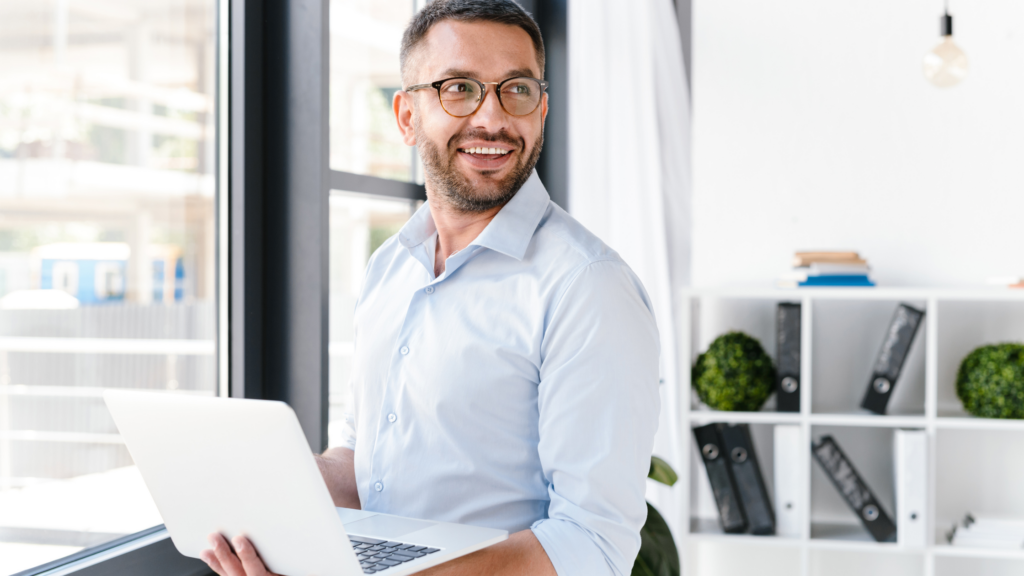man on laptop in office